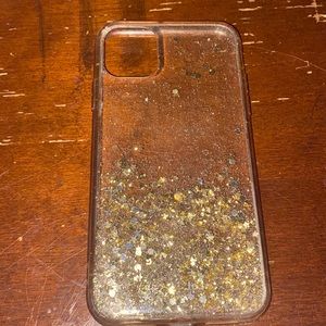 phone case, clear with gold sparkles, used